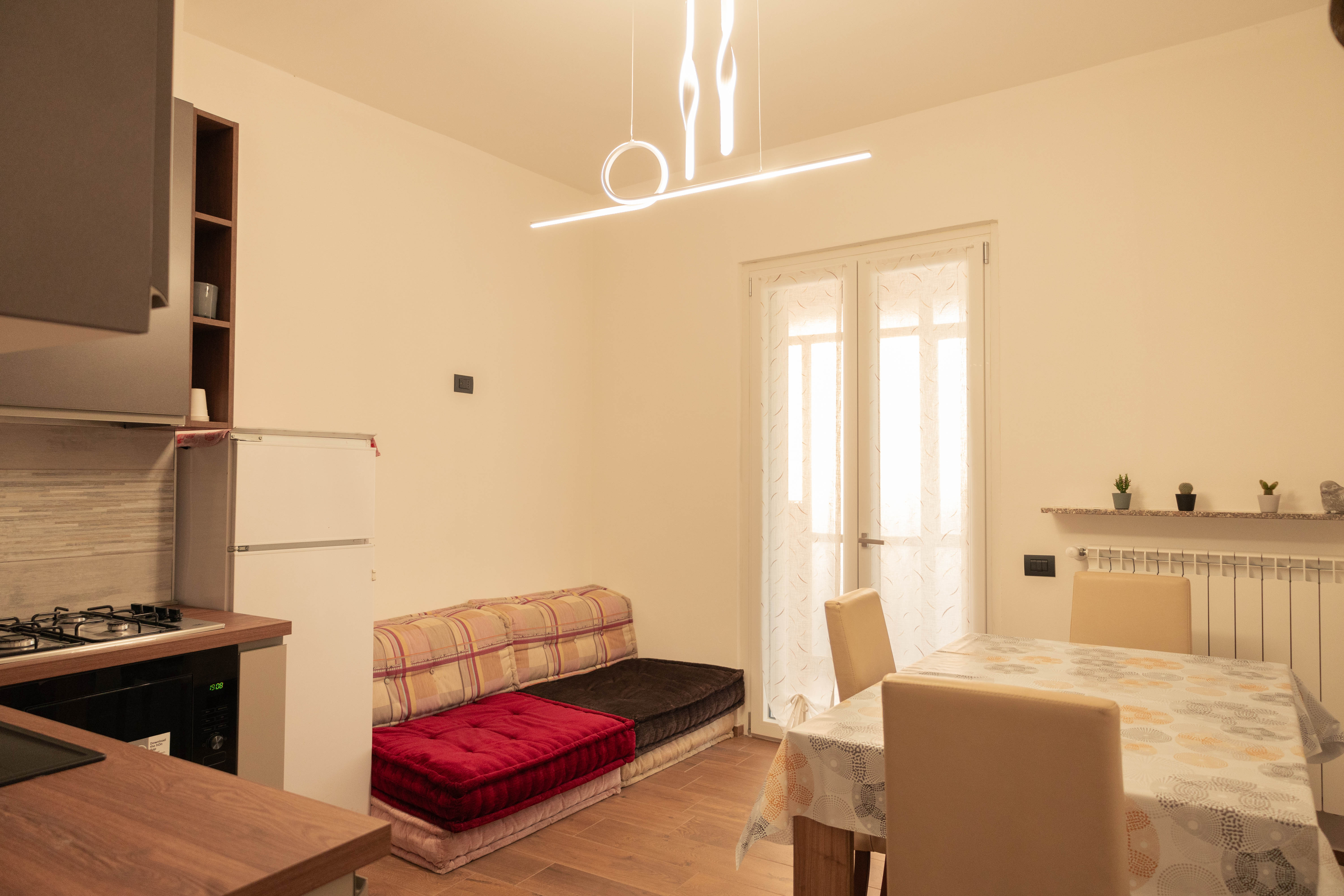 Appartamento 3 — Soggiorno e Cucina (Vista 2)