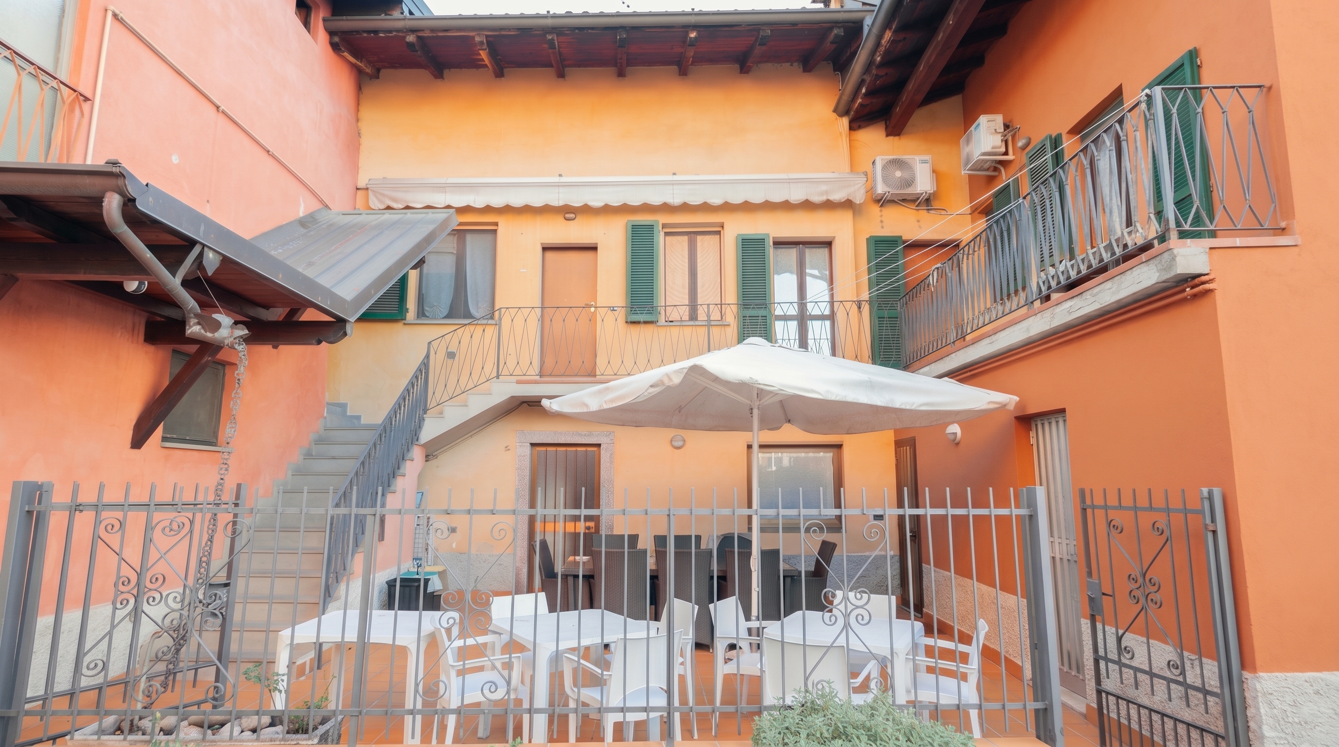 Sweet Home — beautiful Italian countryside courtyard with outdoor dining